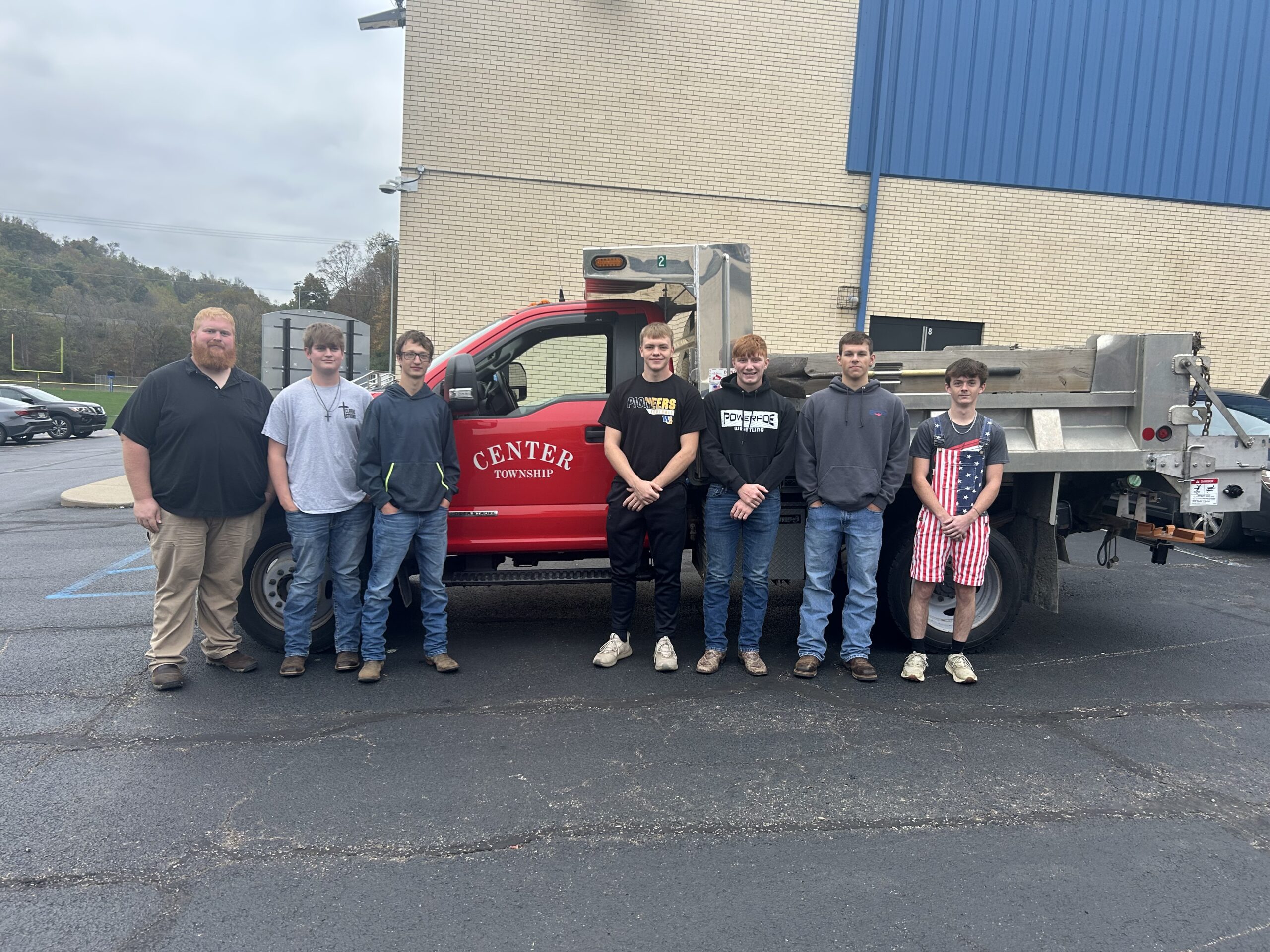 West Greene FFA students pose in front of a Center Township truck they helped repair